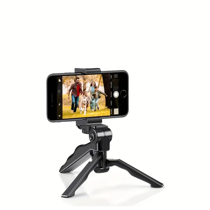Phone holder with smartphone displaying a photo of a family with a dog on a white background